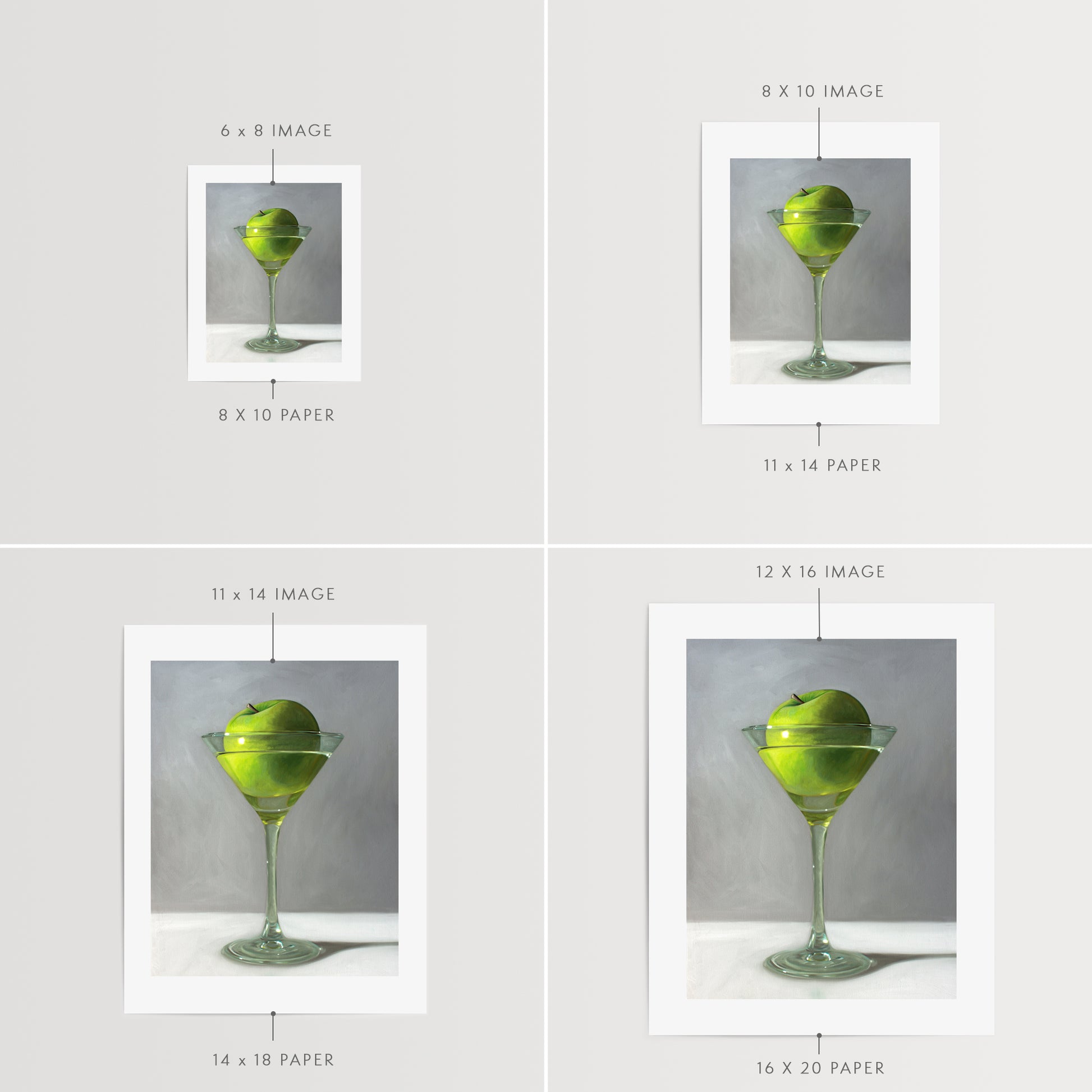 This artwork features a whimsical take on the traditional Apple Martini cocktail. A single granny smith apple rests inside a martini glass on a light, reflective surface with dramatic light and shadows.