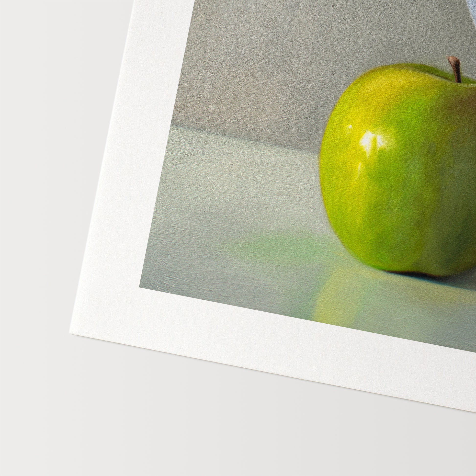 This artwork features a pun on the word ‘Applejack’. A Jack of Hearts playing card is embedded in the upper right corner of a bright green granny smith apple.
