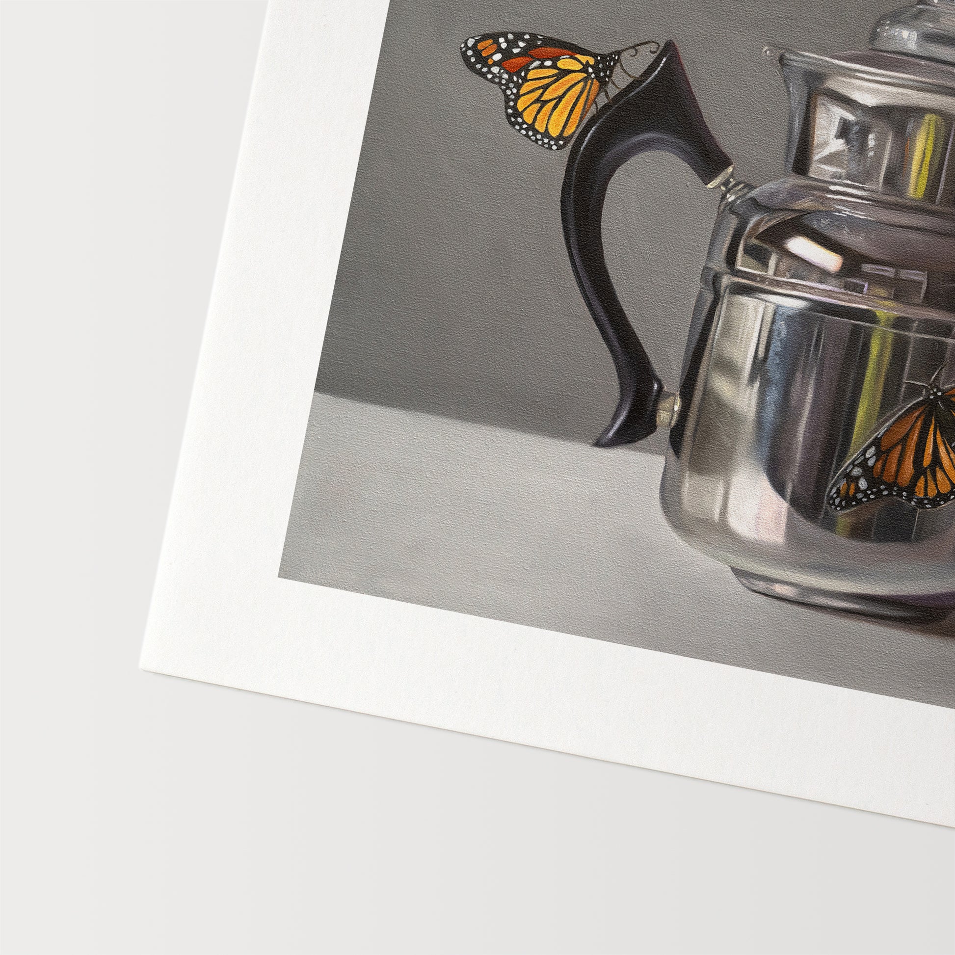 This artwork features a pair of monarch butterflies perched on a vintage reflective kettle.