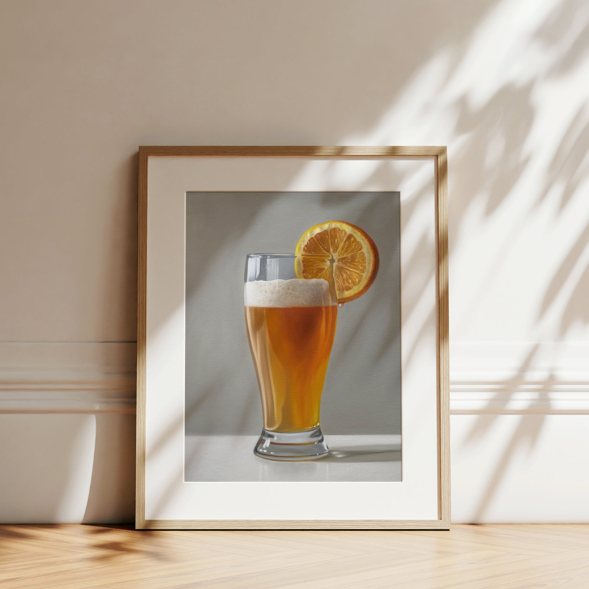 This artwork features a freshly poured Blue Moon beer in a glass with an orange slice and a nice bit of foam.