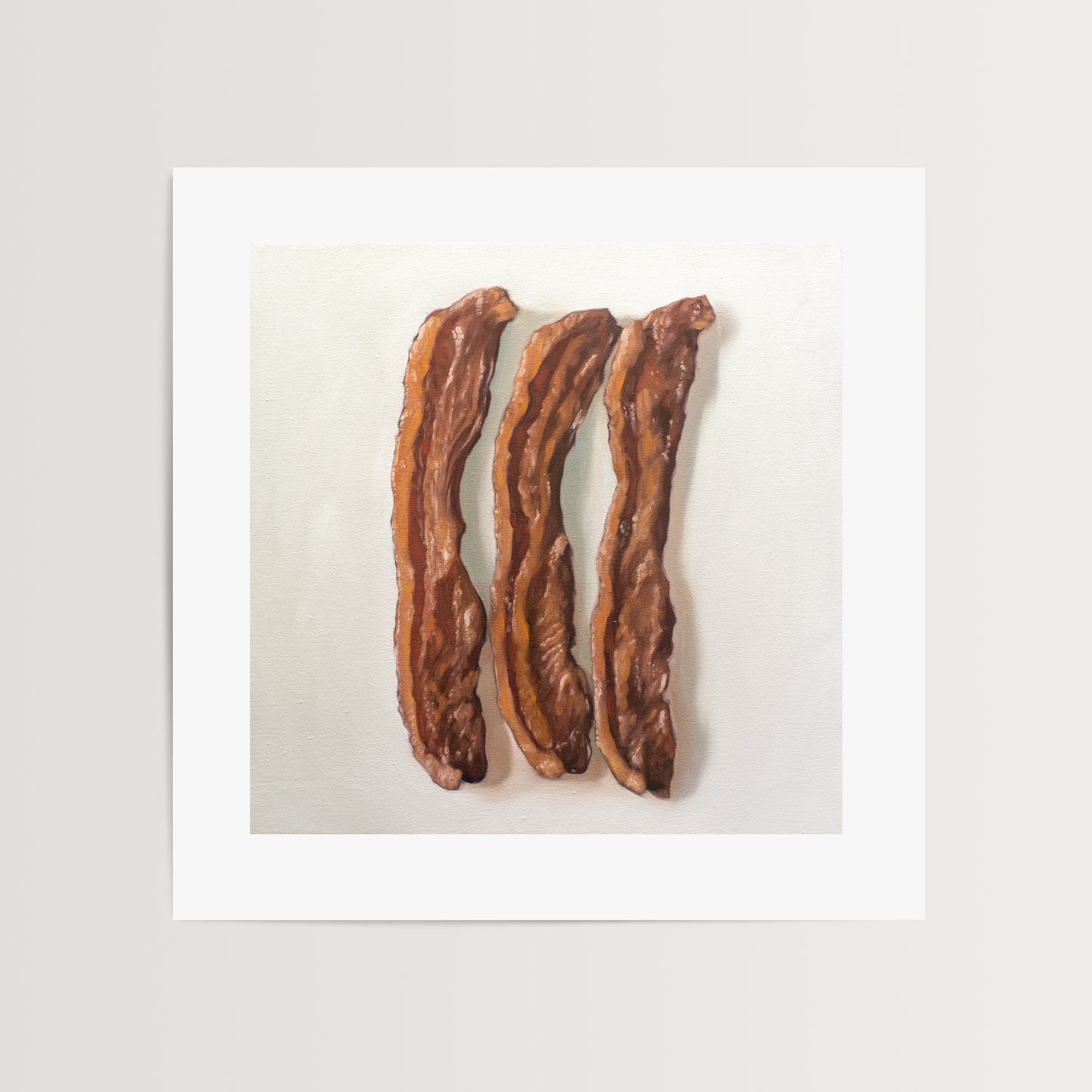 This artwork features a trio of freshly fried bacon strips.