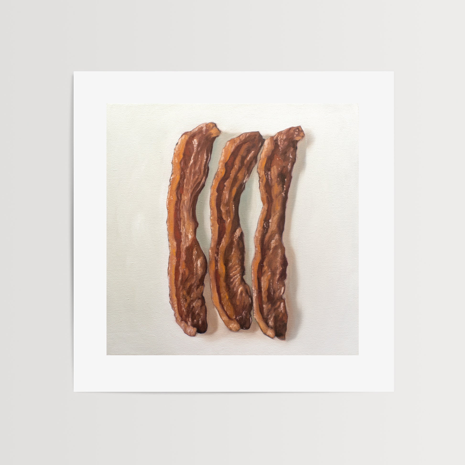 This artwork features a trio of freshly fried bacon strips.