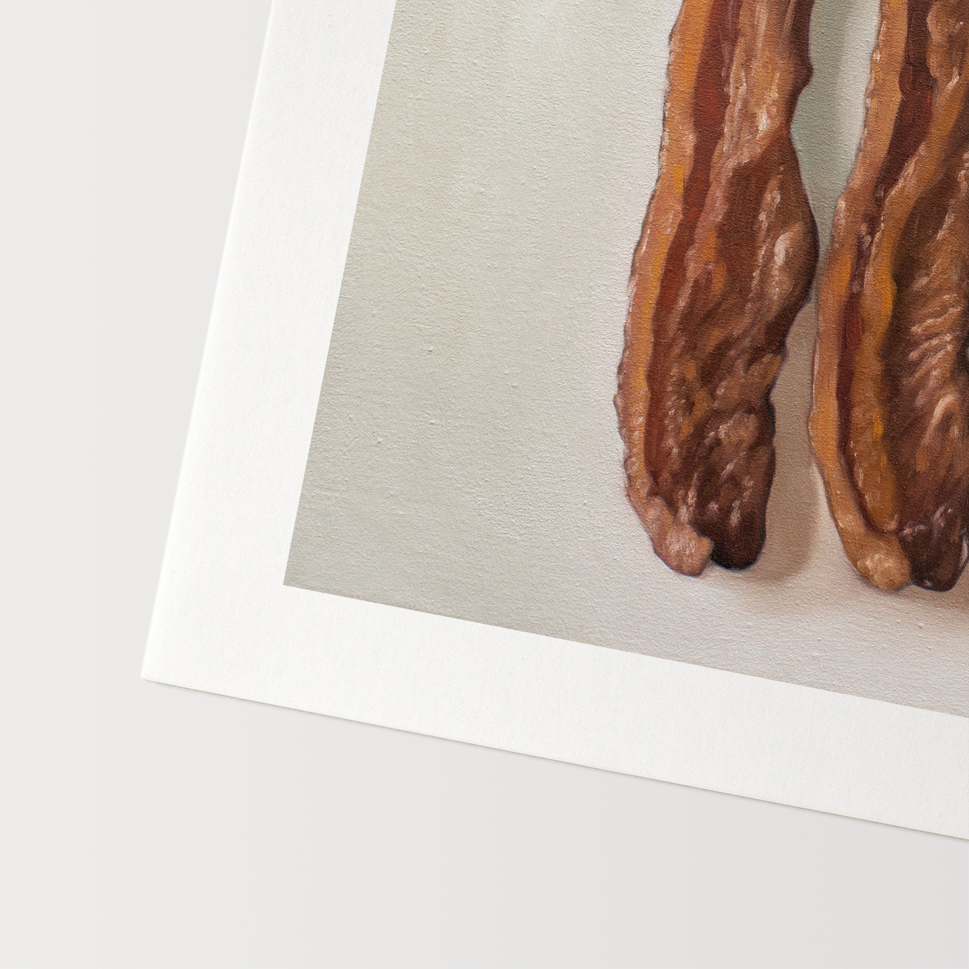 This artwork features a trio of freshly fried bacon strips.