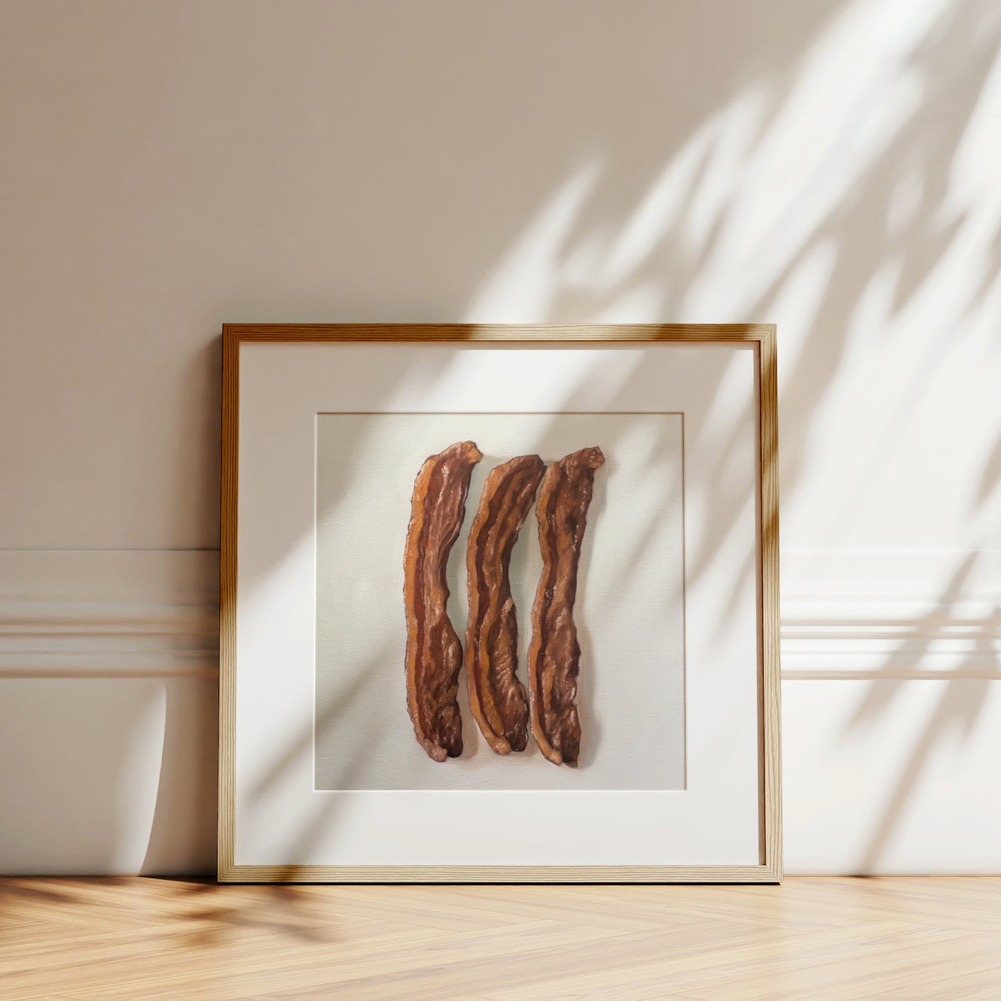 This artwork features a trio of freshly fried bacon strips.