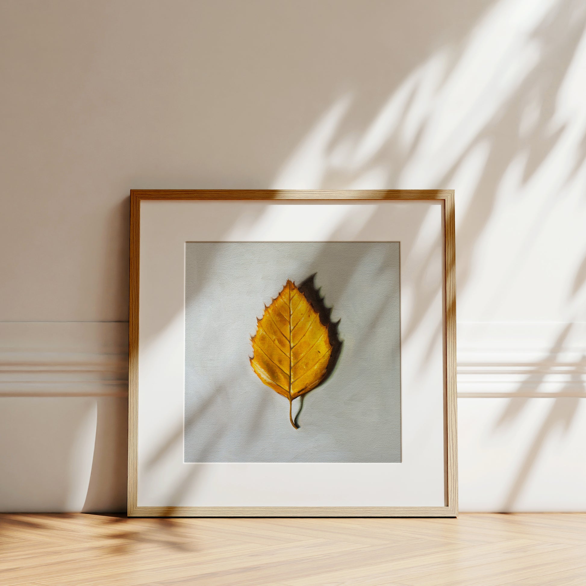 This artwork features a single Birch tree leaf in its brilliant Autumn yellow color.