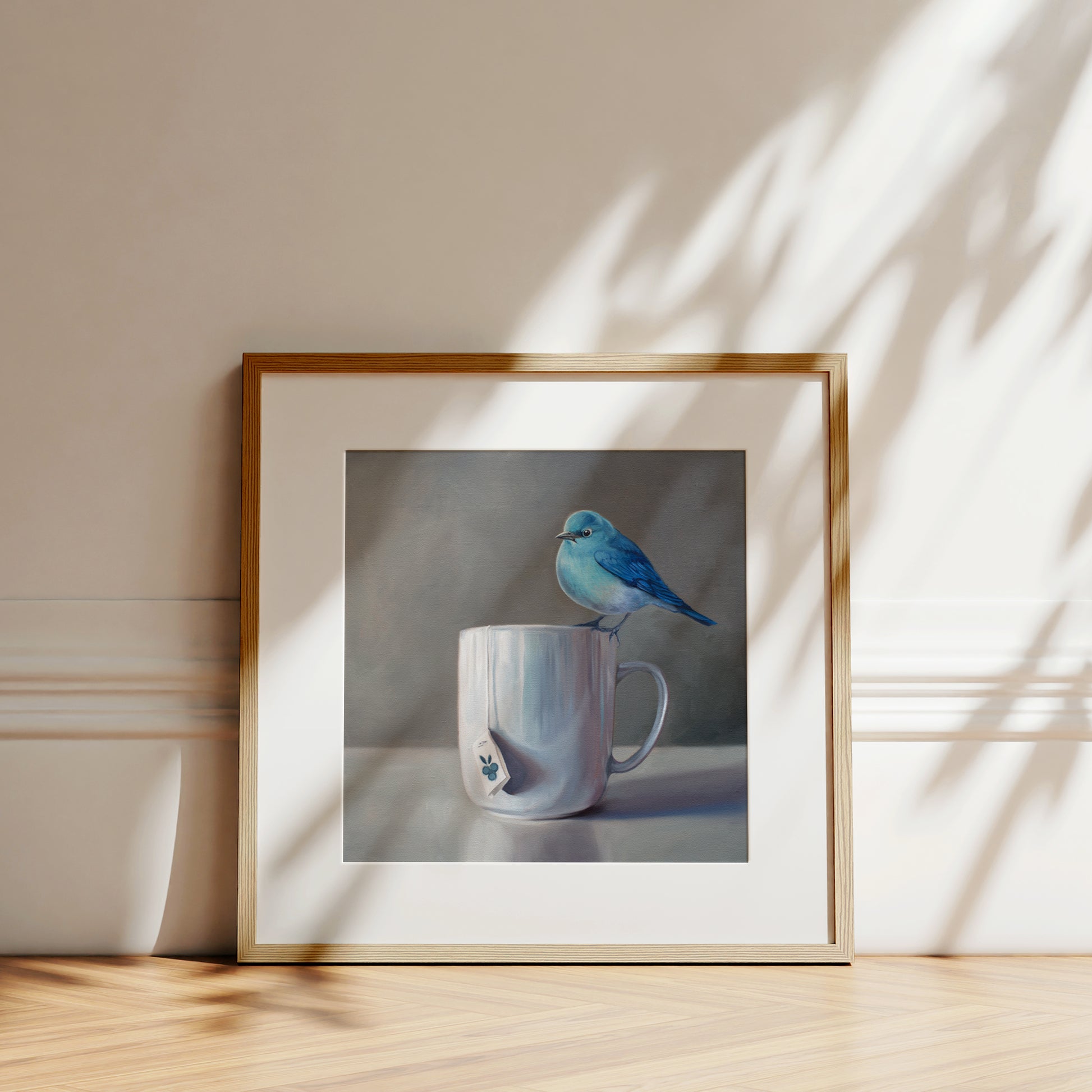 The perfect combination to roll in the Spring season featuring a Mountain Bluebird perched on a cup of Blueberry Tea.