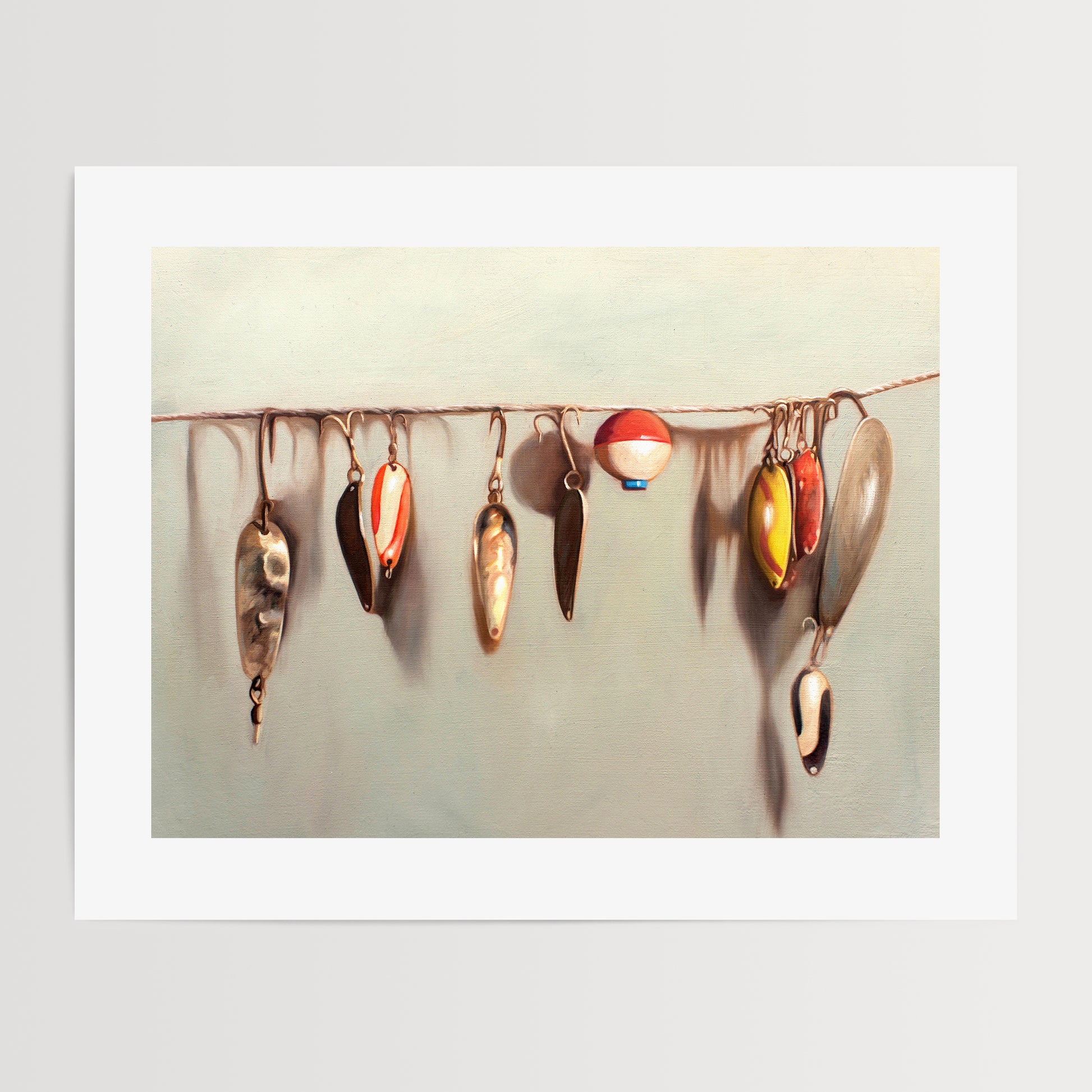 This artwork features a string fashioned with a variety of vintage fishing lures.