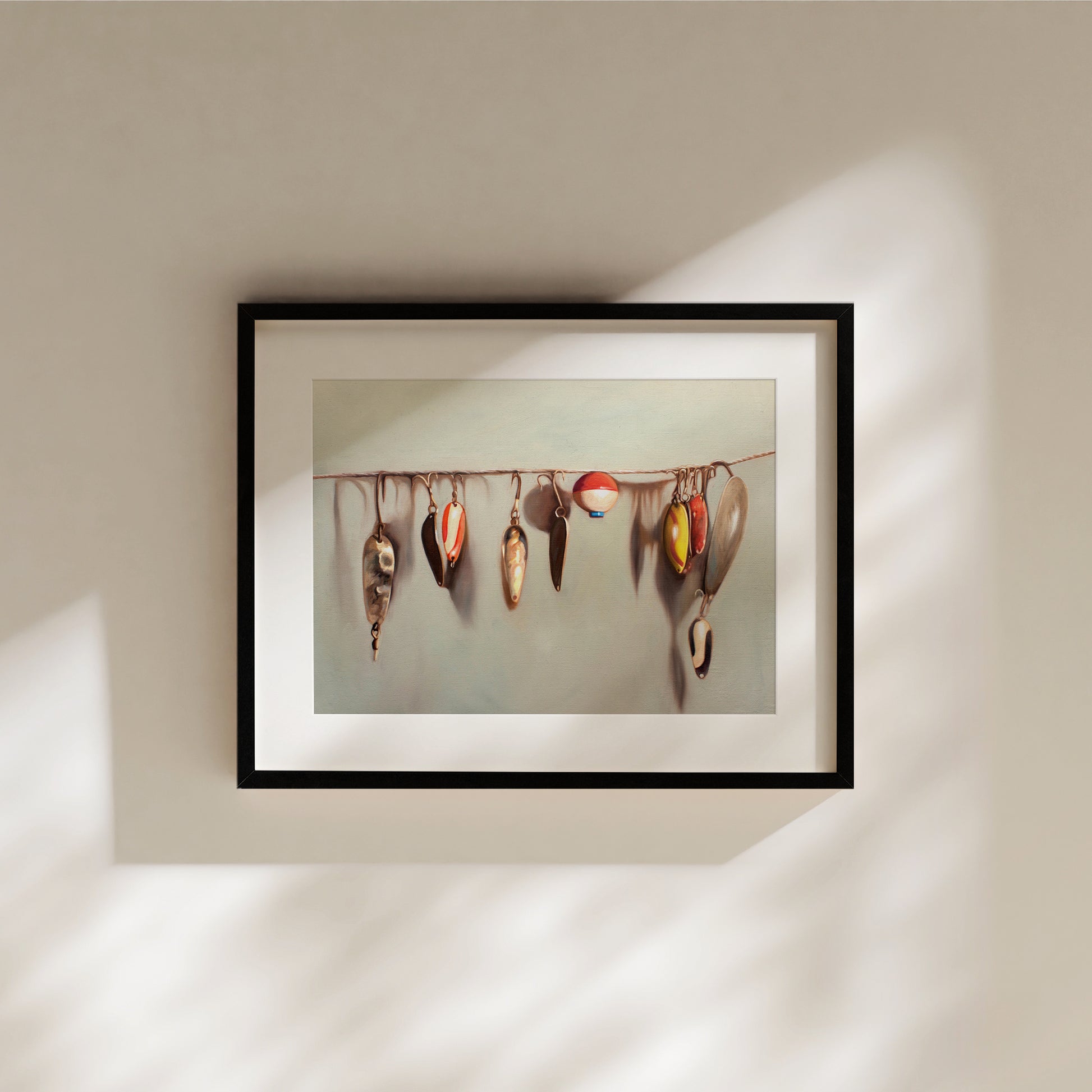 This artwork features a string fashioned with a variety of vintage fishing lures.