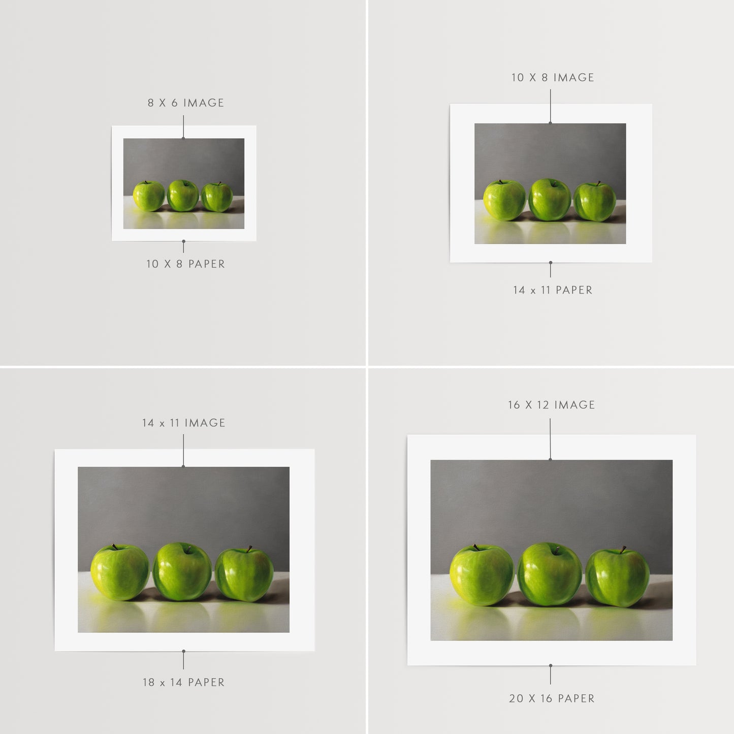 This artwork features a trio of bright green granny smith apples resting on a light, reflective surface with a neutral grey background.