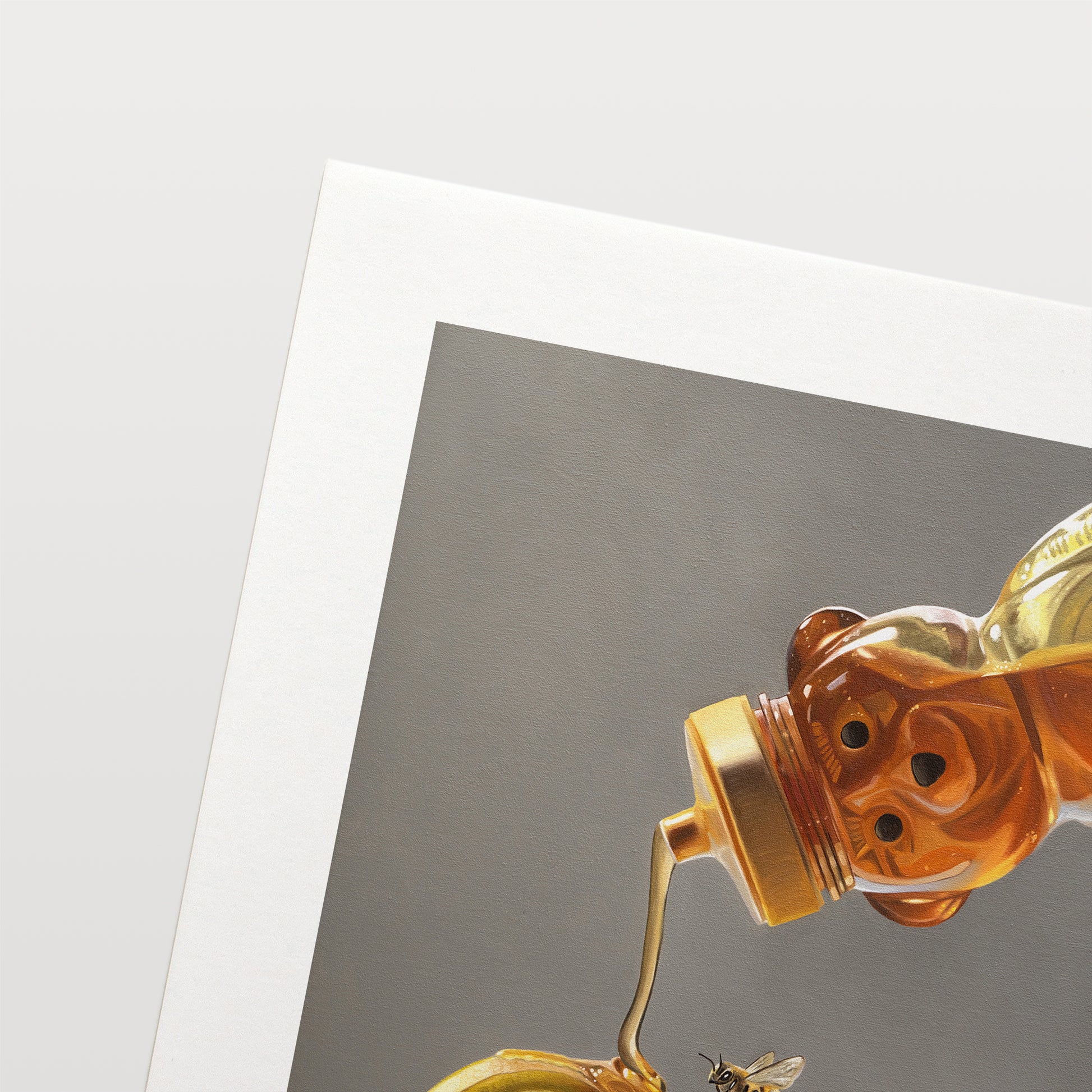 This artwork features a honey bee observing a backlit tipped honey bear bottle drizzling golden honey down onto a lemon slice that rests on the lip of a glass cup of tea.