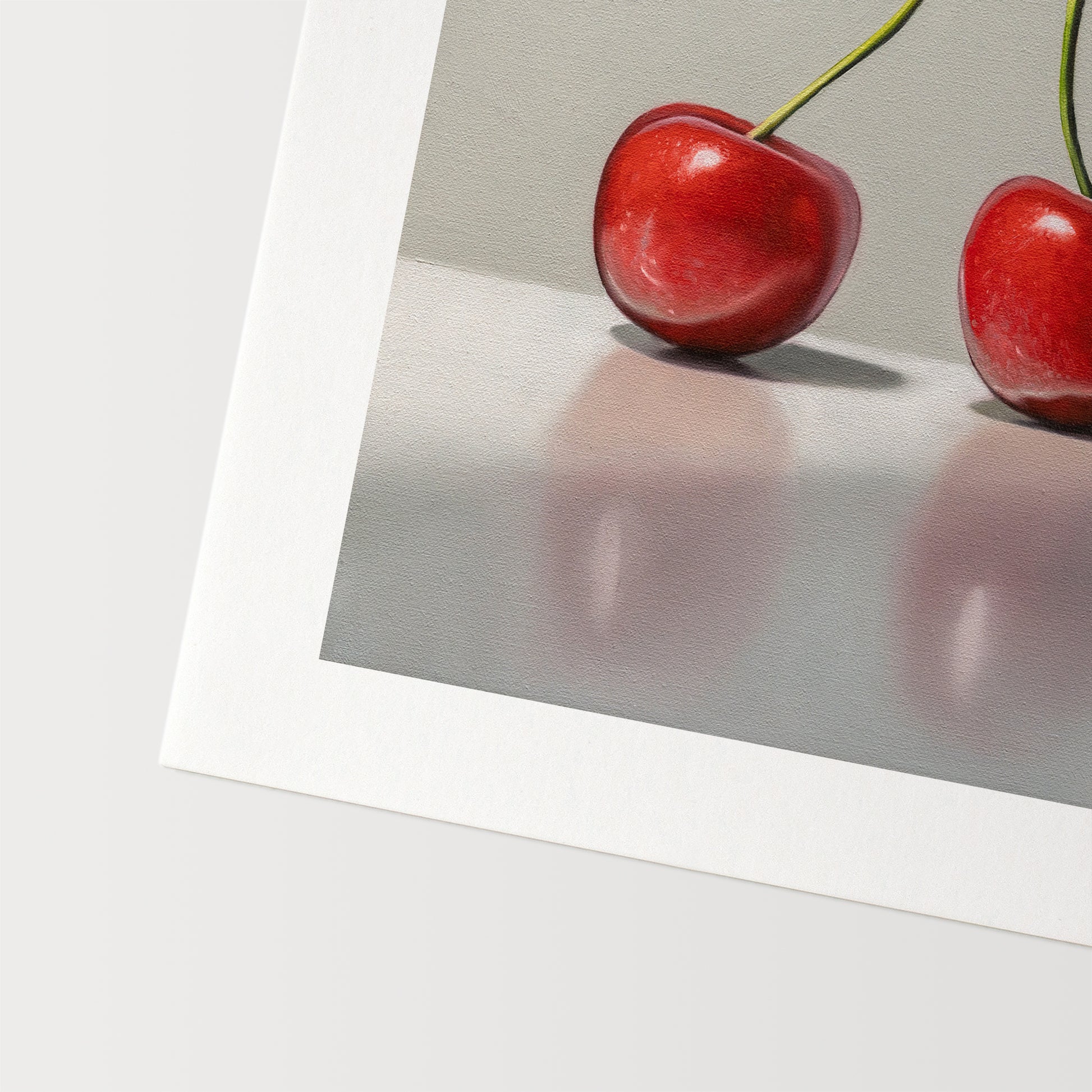 This painting features a trio of cherries in varied lighting on a reflective surface.