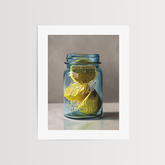 This artwork features a vintage turquoise jar containing a trio of lemon halves.