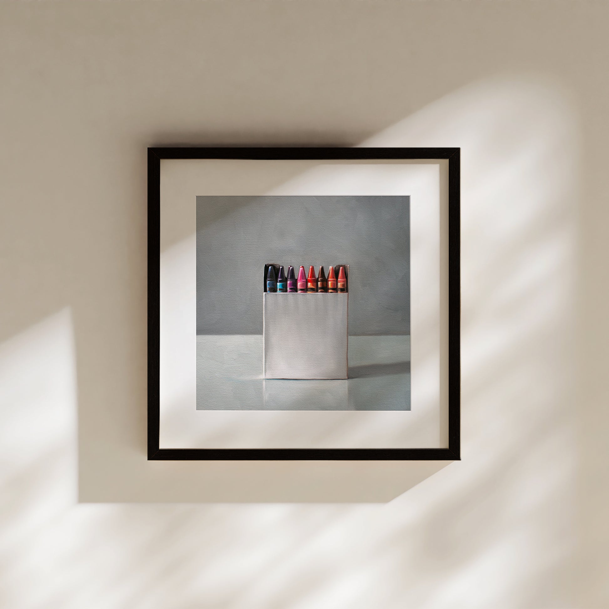 This artwork features a simple white box of crayons resting on a light reflective surface.