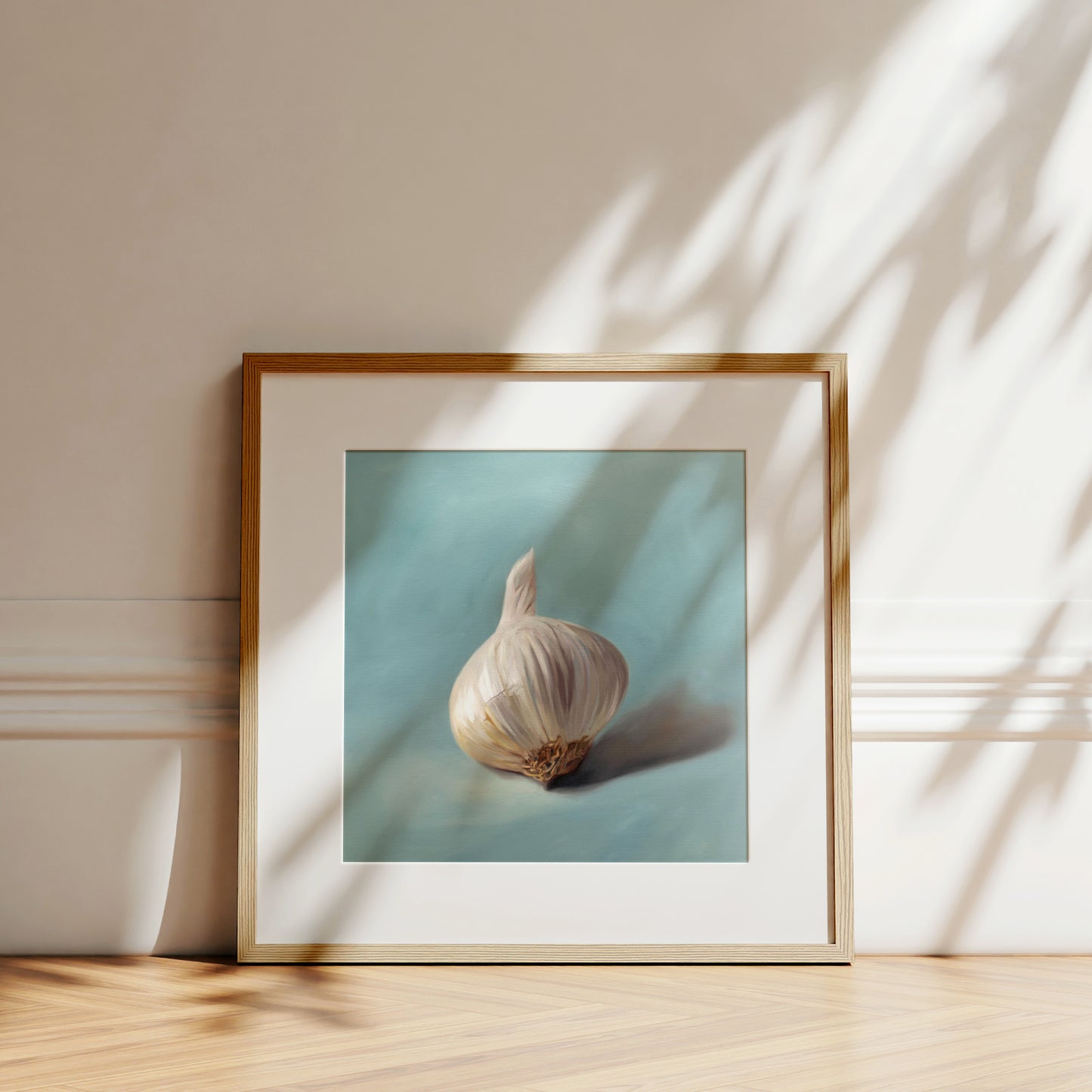 This artwork features a single garlic bulb with on a neutral light blue background.