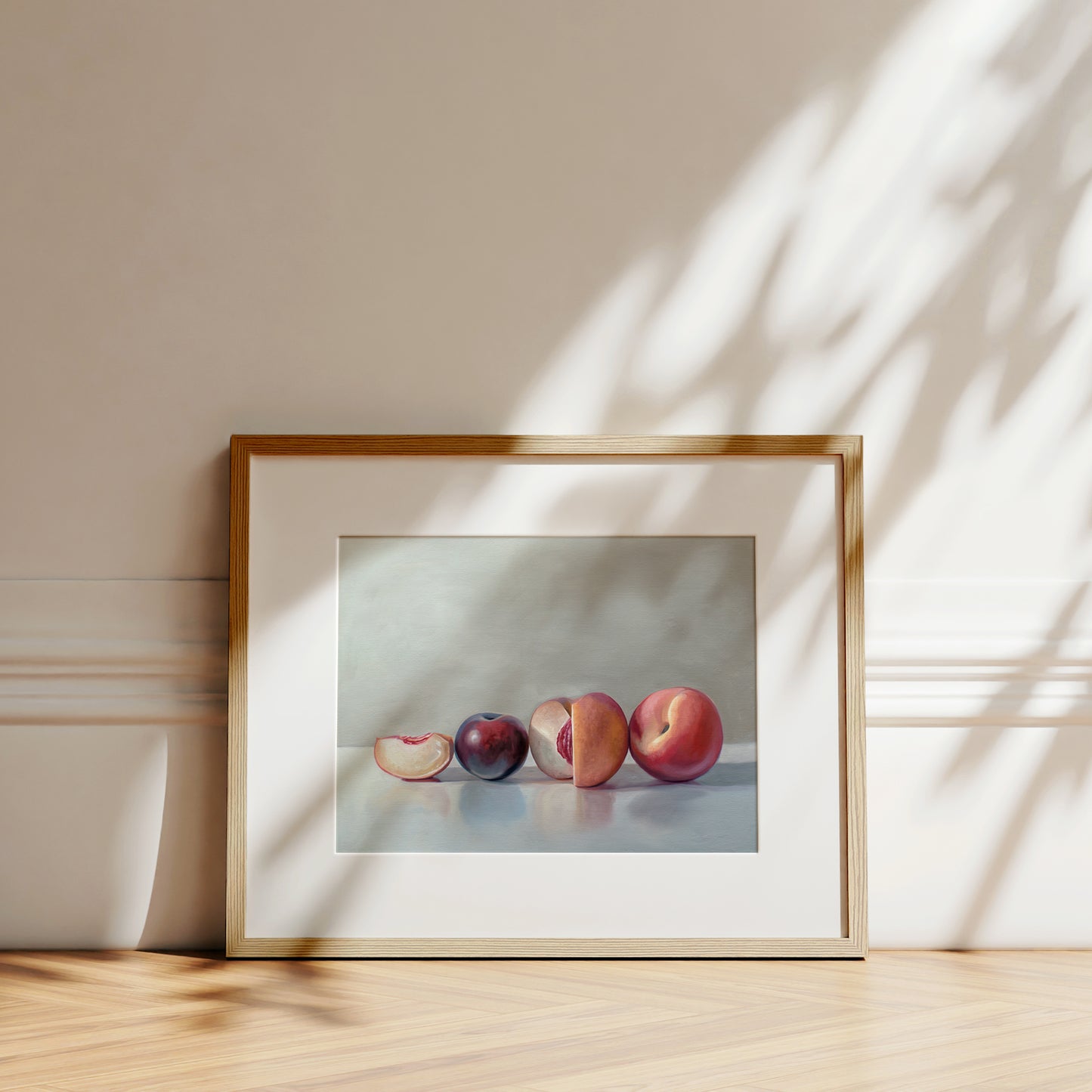 This artwork features a pair of peaches and a single plum resting on a light, reflective surface.