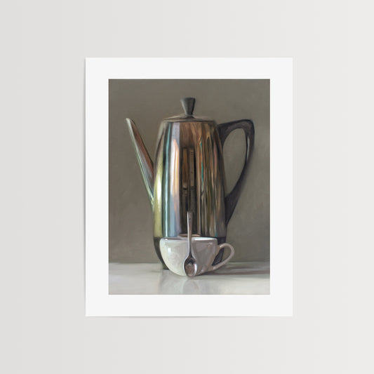This artwork features a reflective percolator, porcelain coffee cup and small spoon resting on a light reflective surface with neutral grey tones.