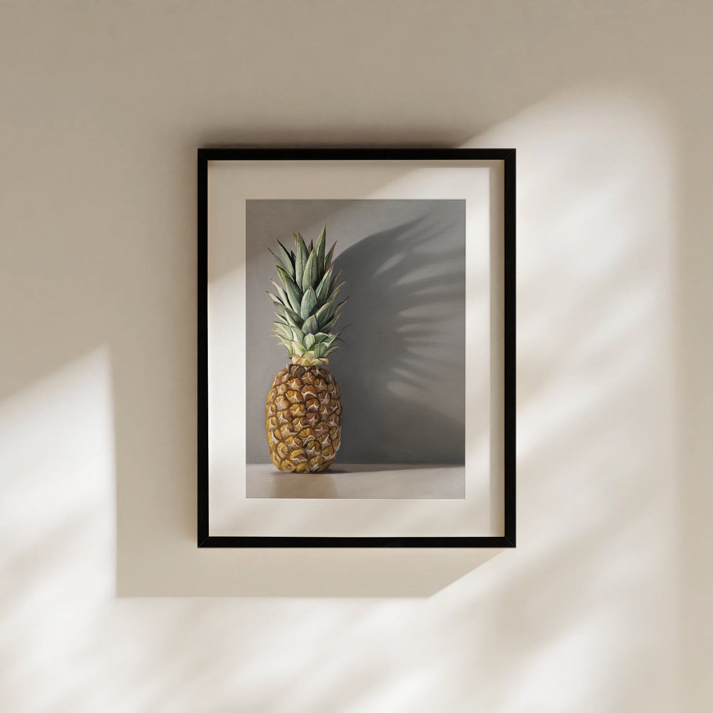 This artwork features a pineapple resting directly in front of a neutral grey wall with dramatic side-lighting creating interesting cast shadows.