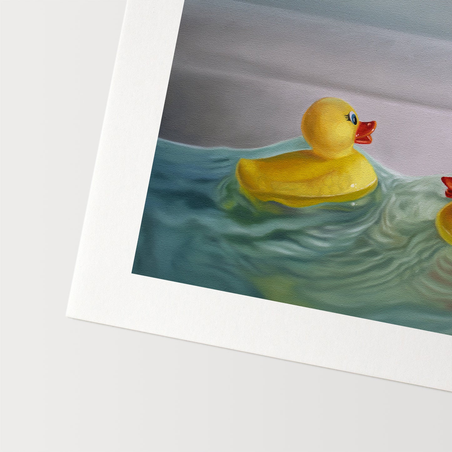 This artwork a pair of rubber duckies hitting the waves in a bathroom sink with some nice dramatic lighting.