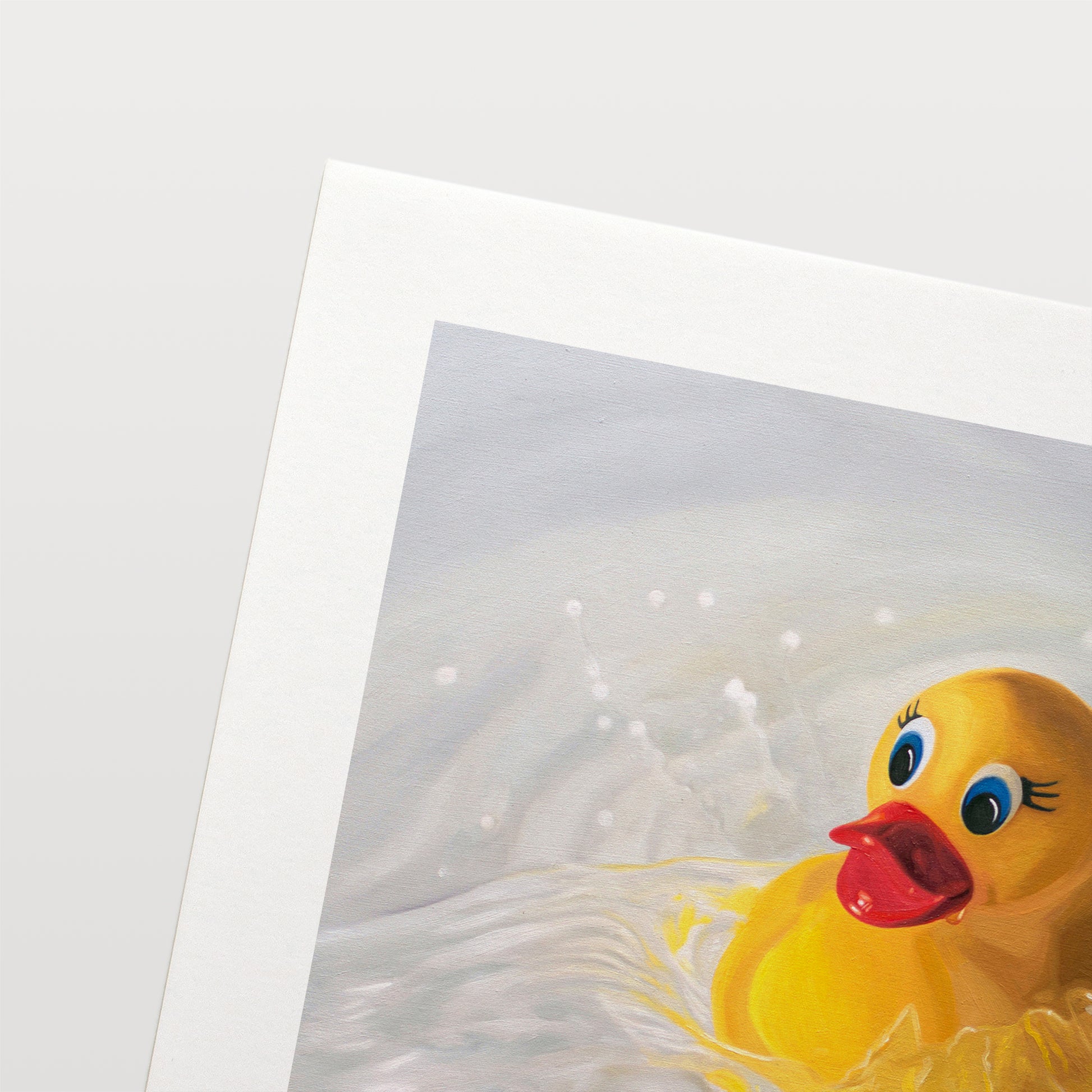 This artwork features a rubber ducky being dropped into a pool of water surrounded by ripples and splashes.
