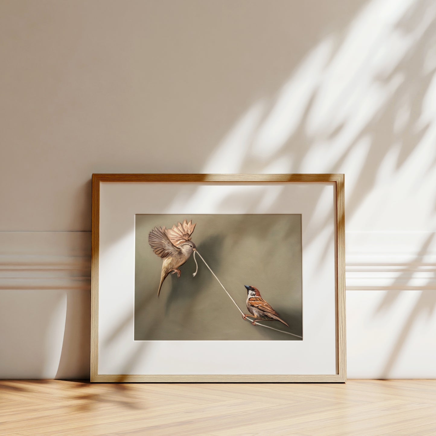 This artwork features a pair of house sparrows playing with a piece of white string