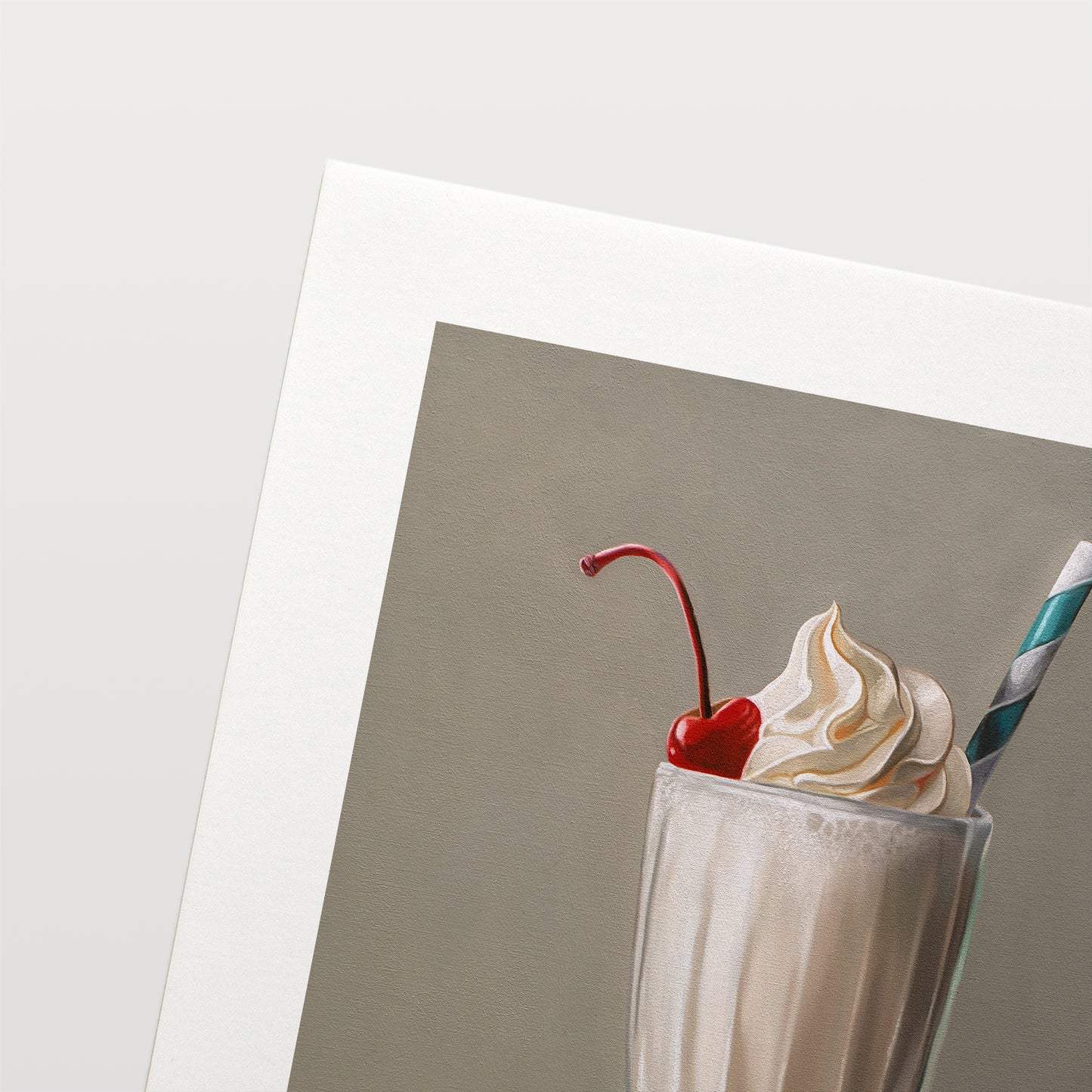 This artwork features an ice-cool vanilla milkshake with a generous amount of twisted whip cream, a maraschino cherry and classic striped straw.