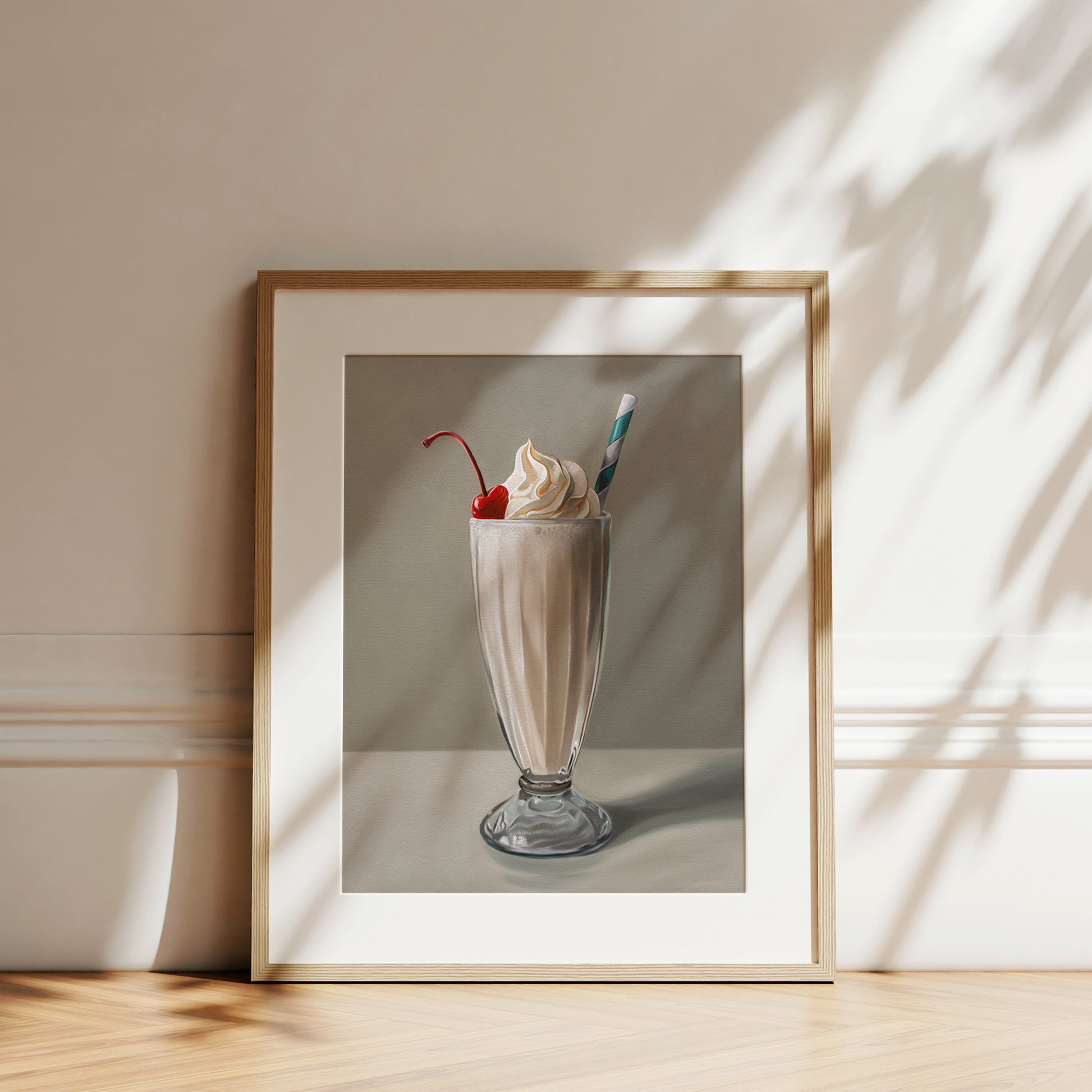 This artwork features an ice-cool vanilla milkshake with a generous amount of twisted whip cream, a maraschino cherry and classic striped straw.