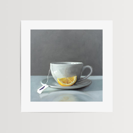 This artwork features a porcelain cup and saucer with tea and a lemon wedge.