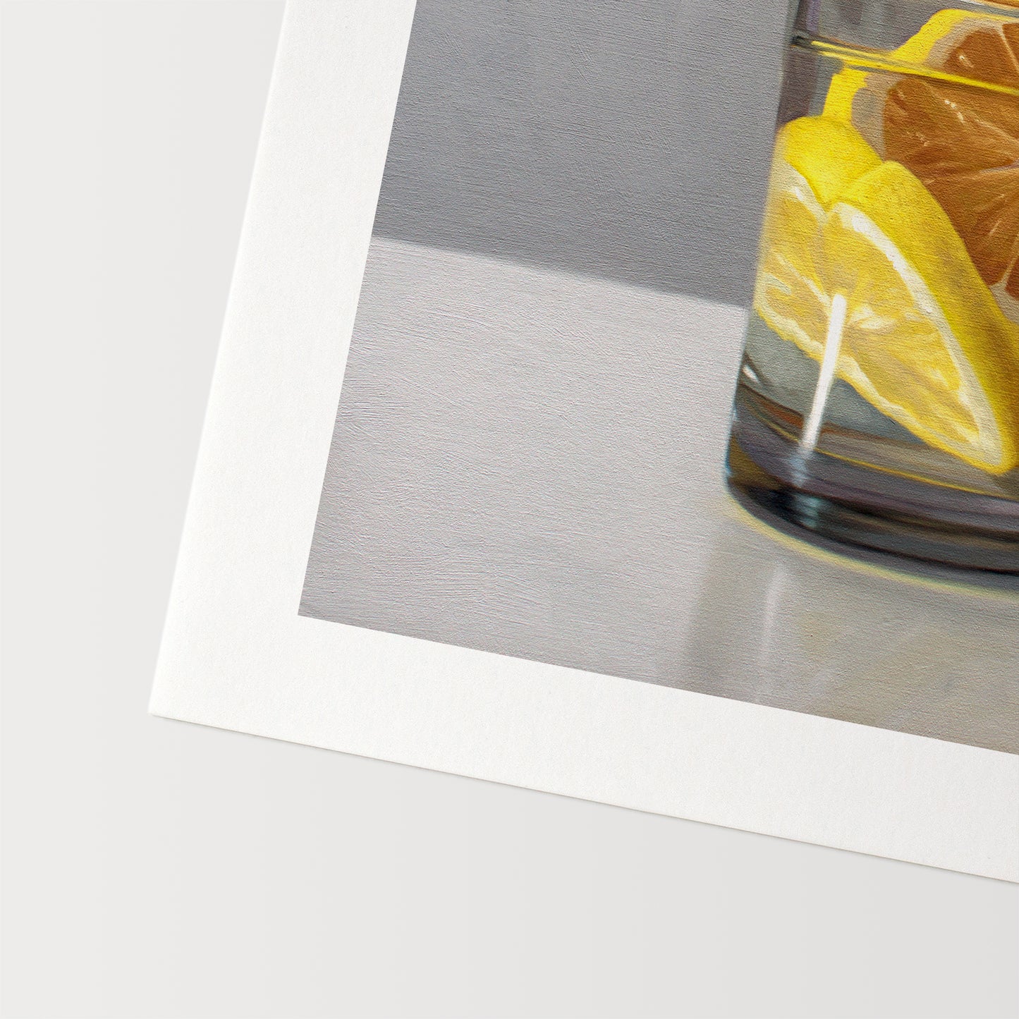 This artwork features a short glass of gin and tonic with two slices of lemon.