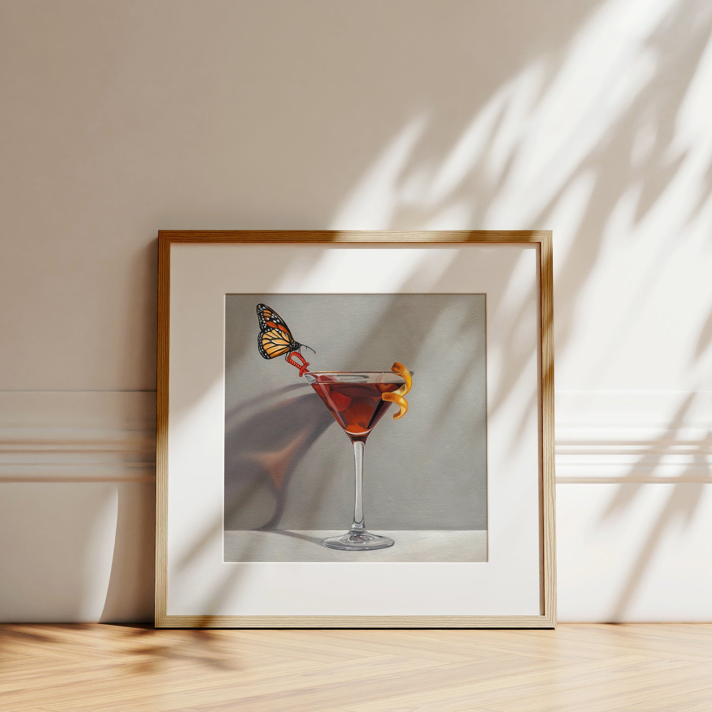This artwork features a Monarch butterfly perched on a Manhattan cocktail with cherries and an orange twist garnish.