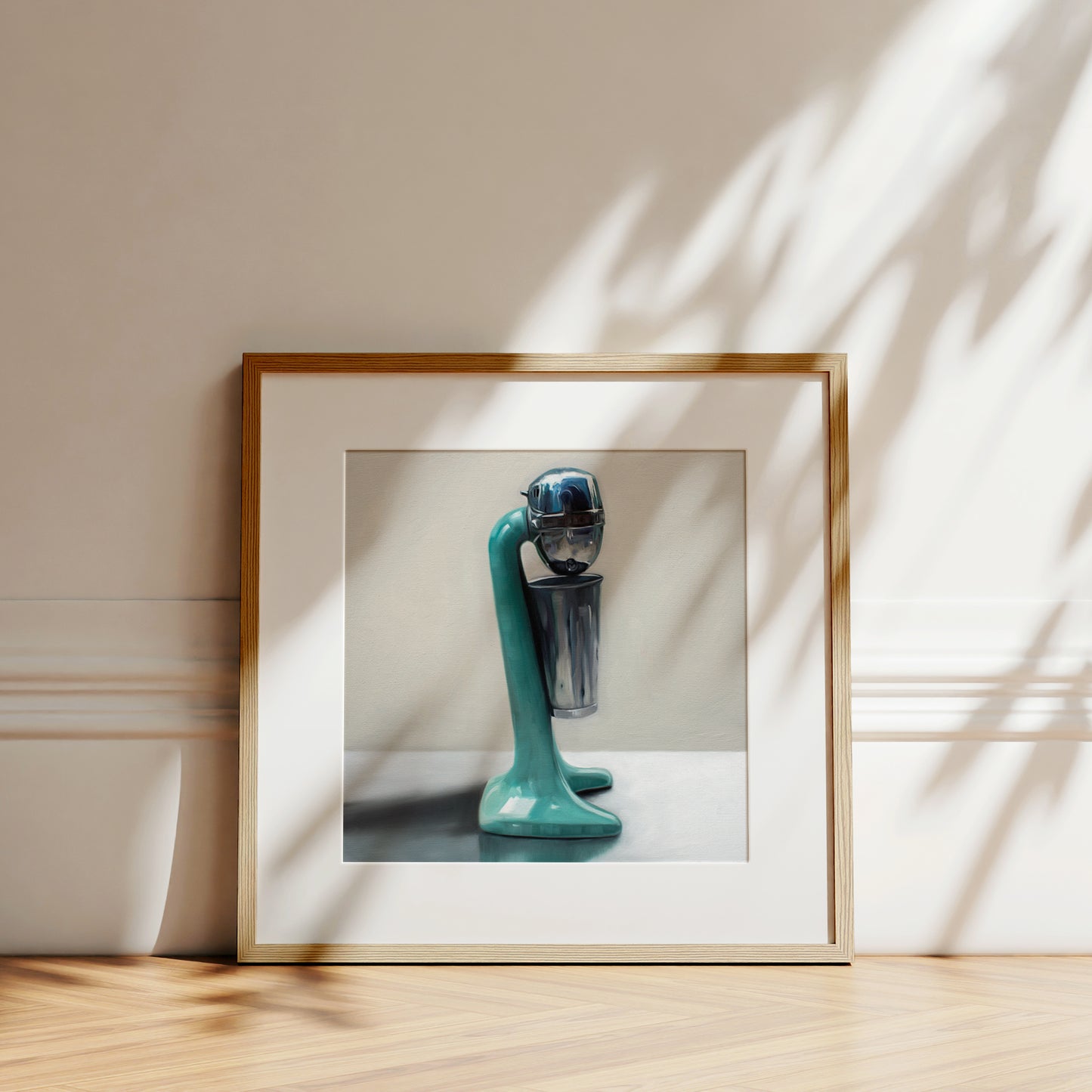 This artwork features a vintage turquoise milkshake mixer resting on a light reflective surface and grey background.