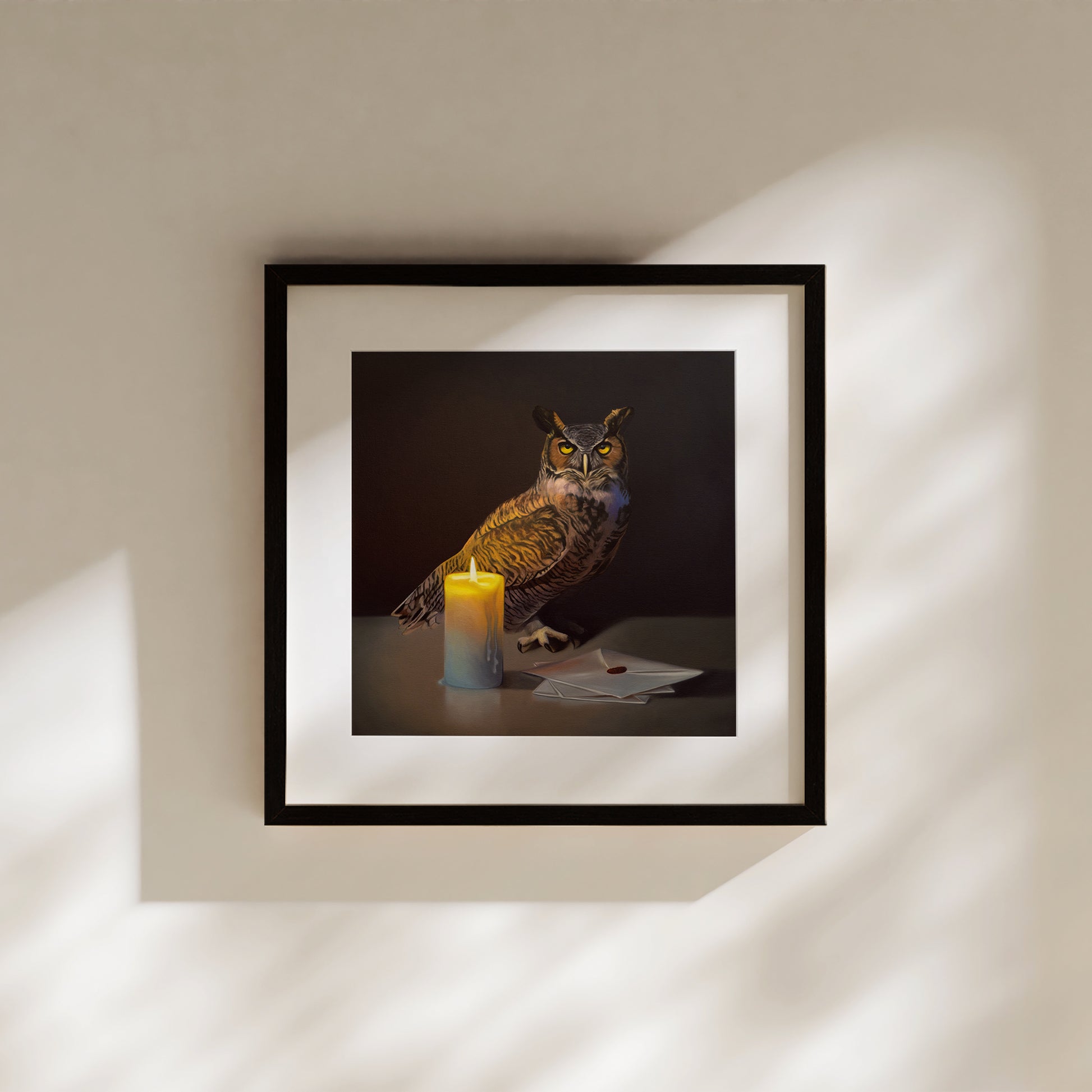 This artwork features a Great Horned Owl standing next to a candle-lit trio of letters with a dark and moody background.