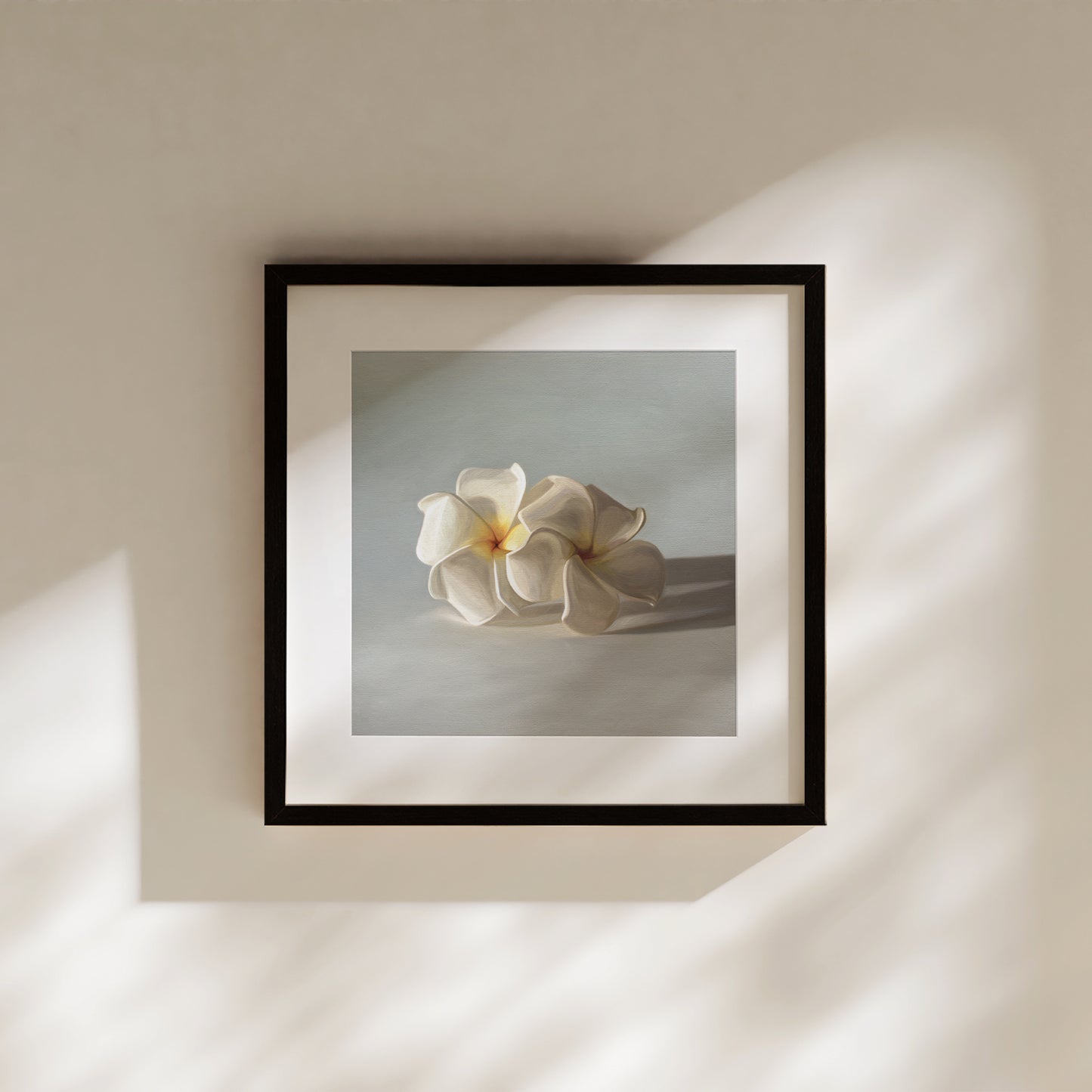 This artwork features a pair of white plumeria blossoms resting on a light bluegrey surface.