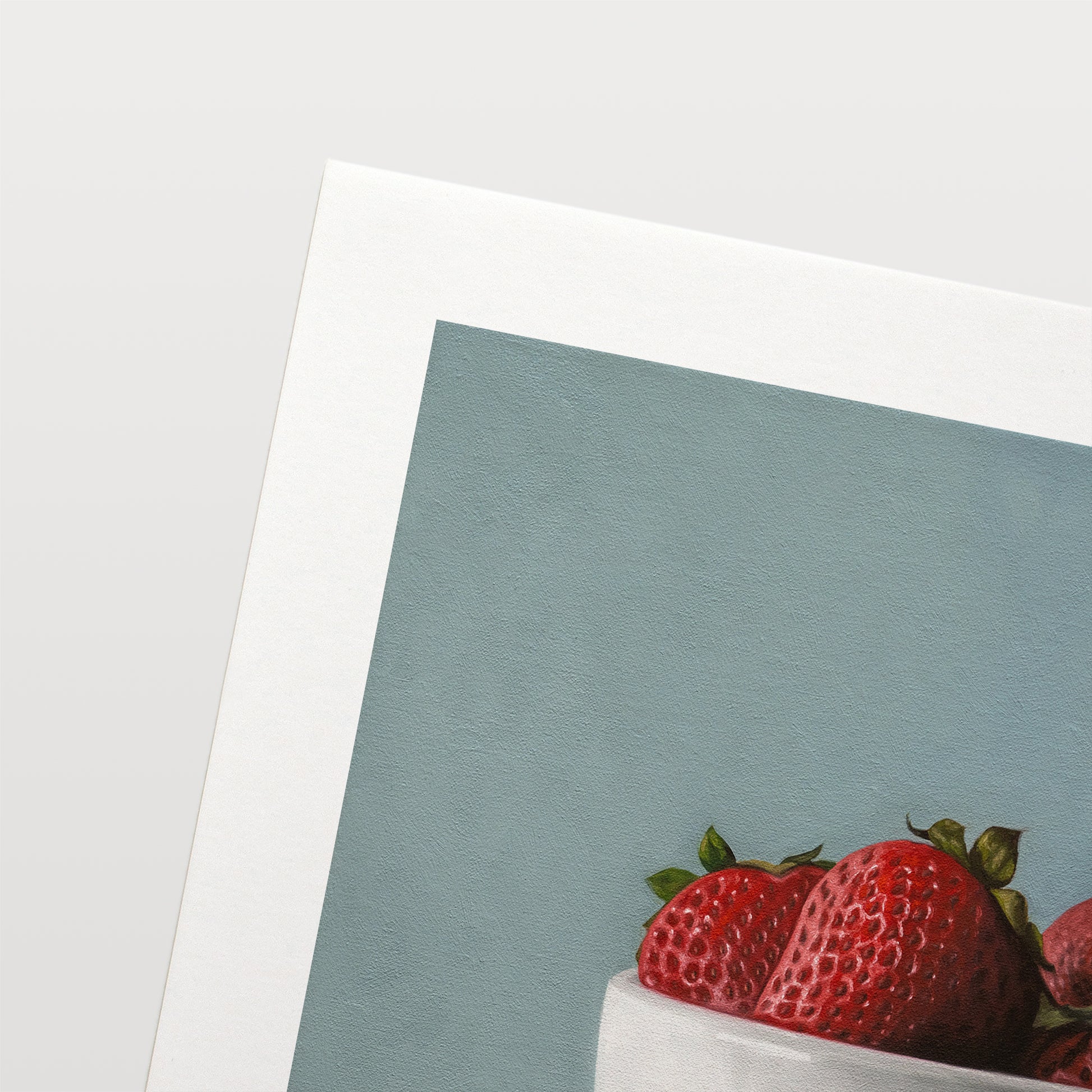 This artwork features a white porcelain cup filled with plump strawberries.