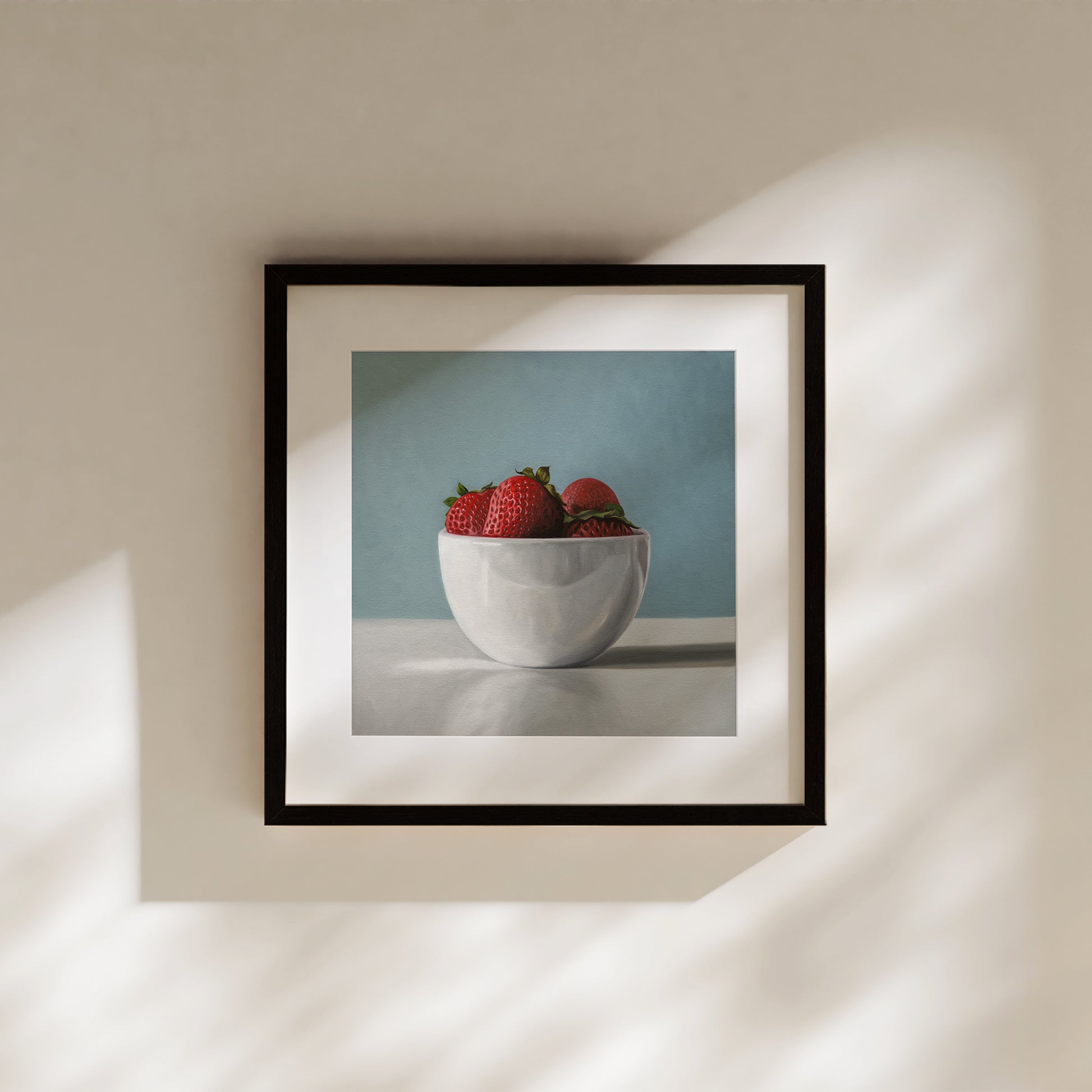 This artwork features a white porcelain cup filled with plump strawberries.