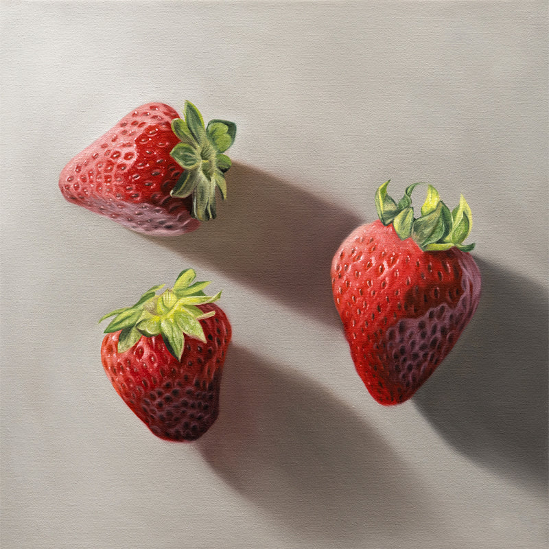 This artwork features a trio of bright red strawberries resting on a neutral grey surface with dramatic light and shadows.
