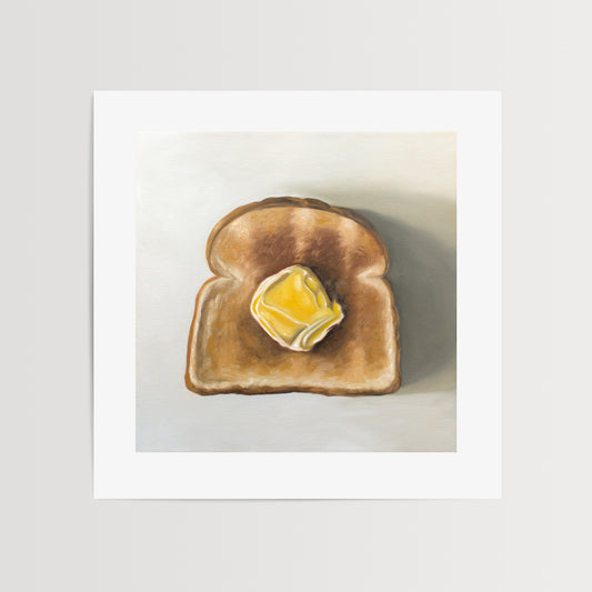 This artwork features a piece of freshly toasted bread with a nice dollop of butter.