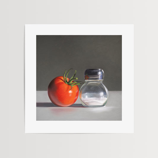 This artwork features a single fresh garden tomato situated by a reflective salt shaker.