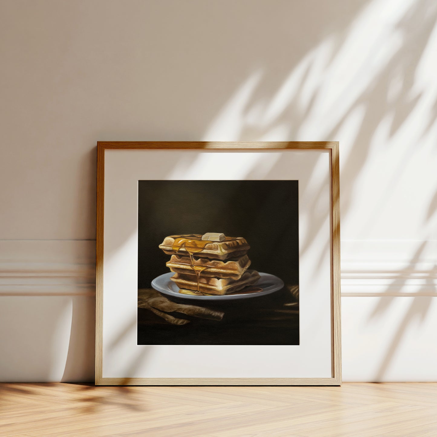 This artwork features a triple stack of freshly made waffles with a generous portion of maple syrup and a dollop of butter on top.