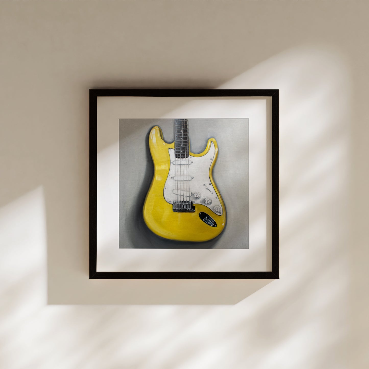 This artwork features a close up view of a bright yellow Stratocaster Guitar resting on a light grey surface.