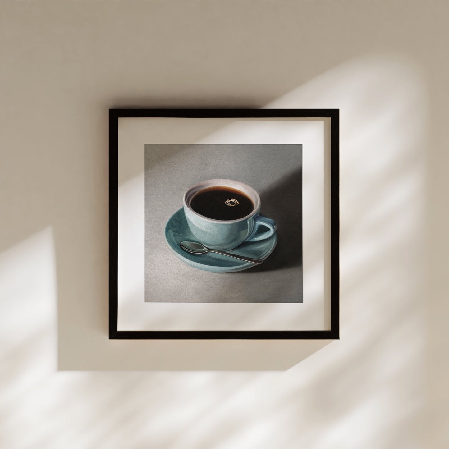 Blue Coffee Cup Fine Art Print by Lauren Pretorius: a light blue cup of coffee resting on a saucer with a spoon..