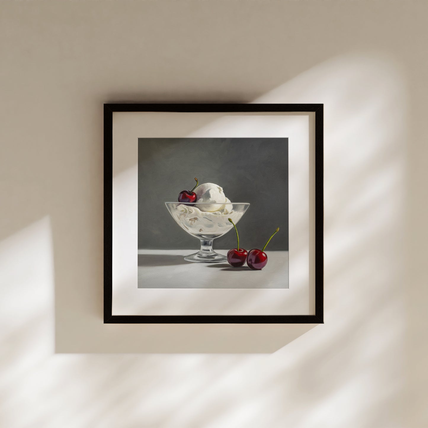 Framed fine art print of a realistic ice cream sundae with cherries in a glass bowl.