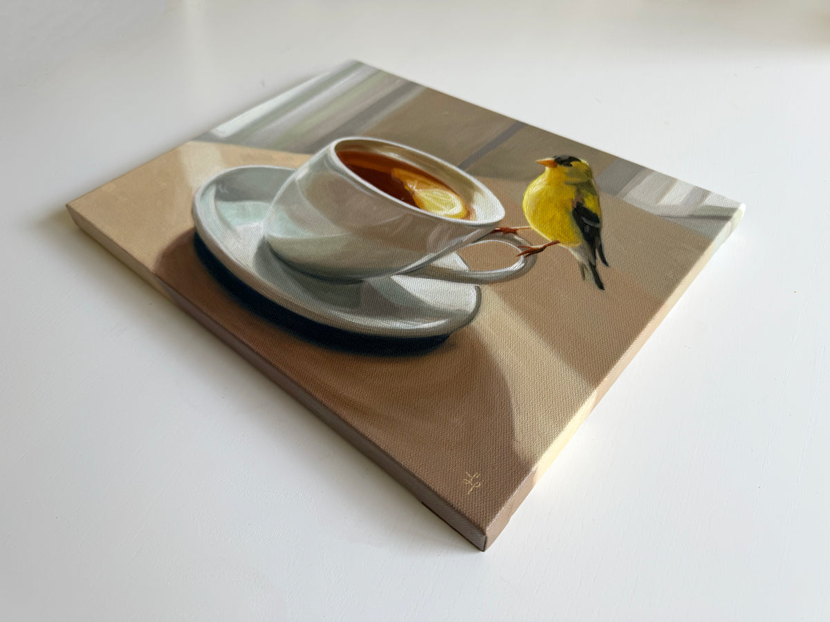 14x11 inch original oil painting on canvas featuring a yellow goldfinch perched on a teacup with lemon.