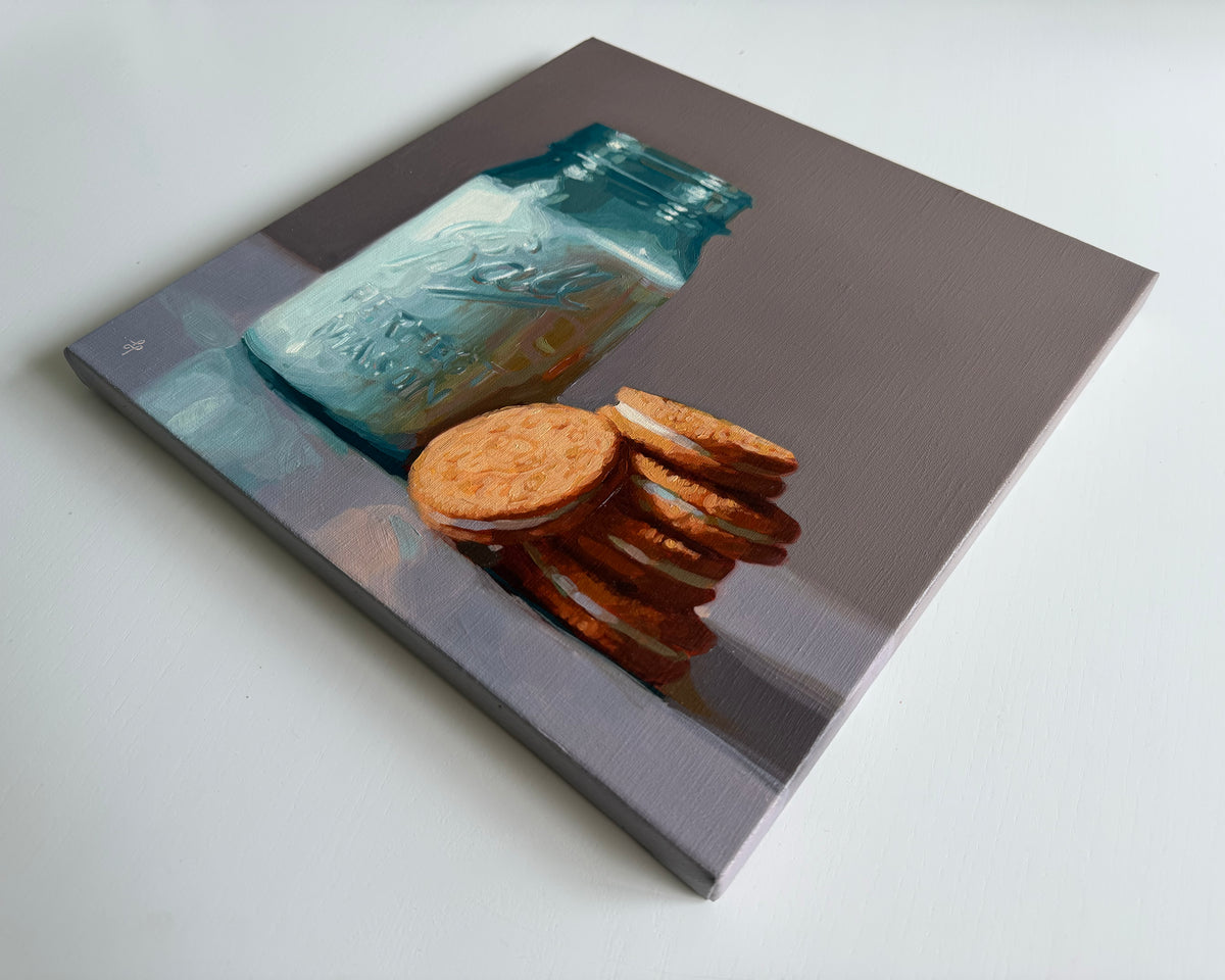 12x12 oil painting on linen featuring golden sandwich cookies and a vintage turquoise mason jar.