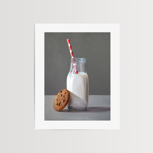 Milk and Cookie Fine Art Print by Lauren Pretorius: a vintage glass bottle of milk and a red striped straw with a single chocolate chip cookie leaning on the bottle.