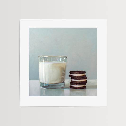 Milk and Cookies Fine Art Print by Lauren Pretorius: a glass of milk and a trio of Double Stuff Oreos on a light, reflective surface with dramatic lighting and cast shadows.