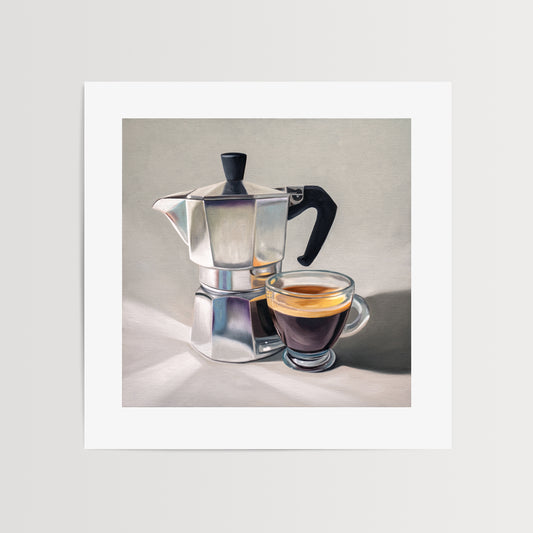 Moka Pot & Espresso Fine Art Print by Lauren Pretorius: a reflective moka pot espresso maker next to a shot of espresso.