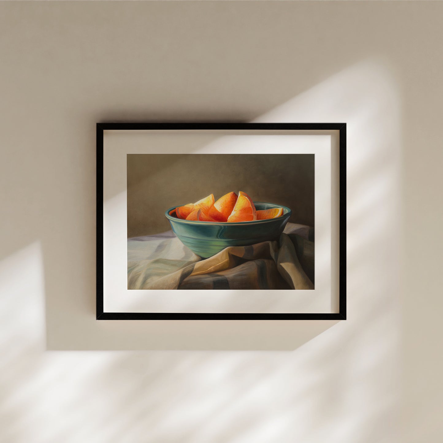 Orange Slices Fine Art Print by Lauren Pretorius: a bowl of orange slices placed on a checkered cloth.