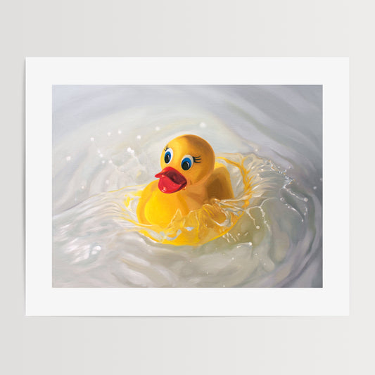 Rubber Ducky Splash Fine Art Print by Lauren Pretorius: a rubber ducky being dropped into a pool of water surrounded by ripples and splashes.