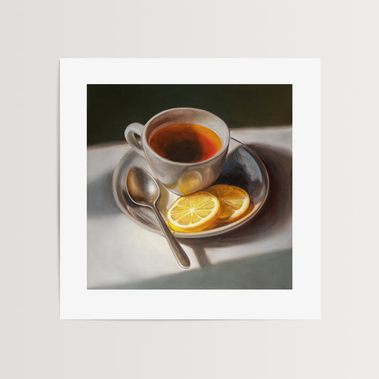Tea with Lemons Fine Art Print by Lauren Pretorius: a cup of tea with lemon slices on a plate, accompanied by a spoon, against a light background.