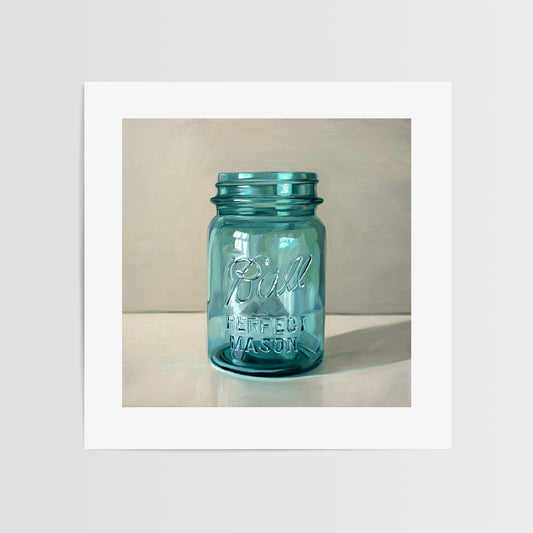 Vintage Turquoise Jar Fine Art Print by Lauren Pretorius: a classic vintage blue glass jar on a light reflective surface.